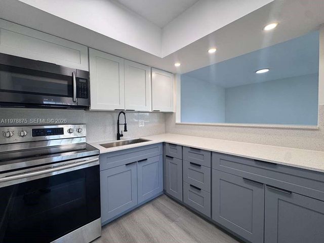 455 Golden Isles Dr 203, Hallandale Beach, FL 33009