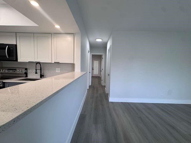 455 Golden Isles Dr 203, Hallandale Beach, FL 33009