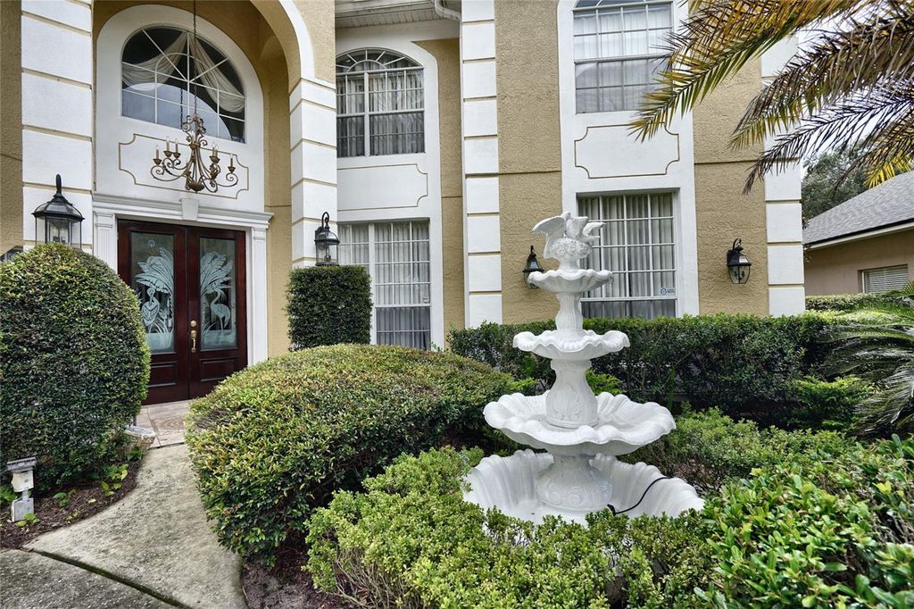Image 2 of property listing at 7730 BARDMOOR HILL CIR, Orlando, FL 32835