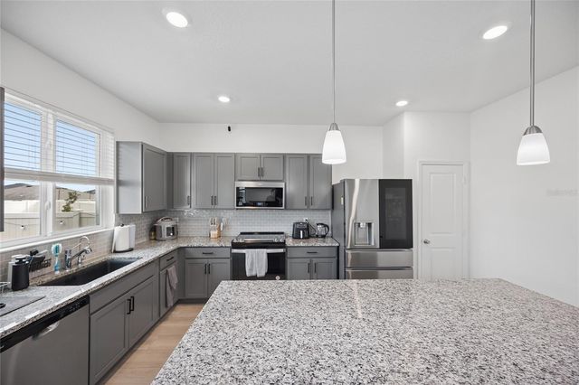 9113 HOOTON WAY, Davenport, FL 33896