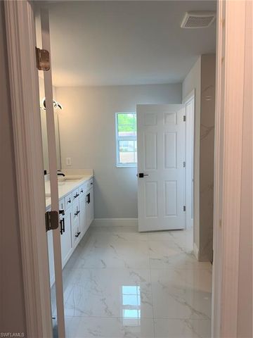 1017 Maple AVE N, Lehigh Acres, FL 33972