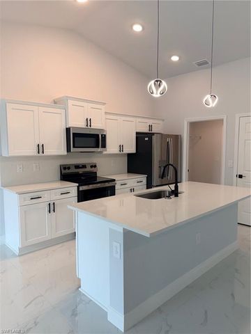 1017 Maple AVE N, Lehigh Acres, FL 33972