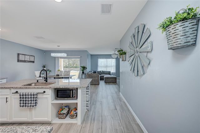 10313 Silver Pond LN, Lehigh Acres, FL 33936