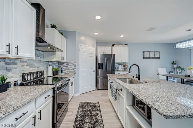 10313 Silver Pond LN, Lehigh Acres, FL 33936