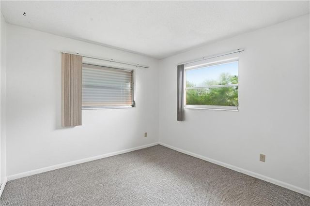 2210 Orchid RD E, Lehigh Acres, FL 33936