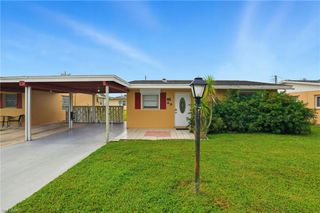 2210 Orchid RD E, Lehigh Acres, FL 33936