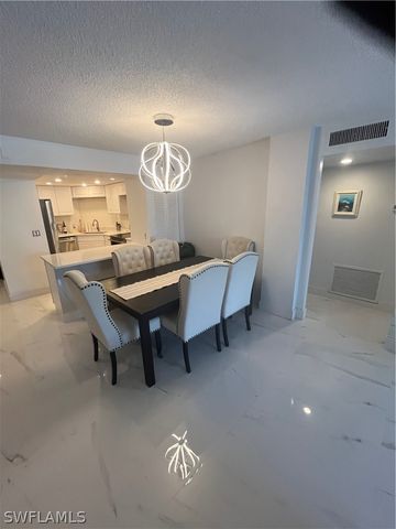 3 Bluebill AVE 207, Naples, FL 34108