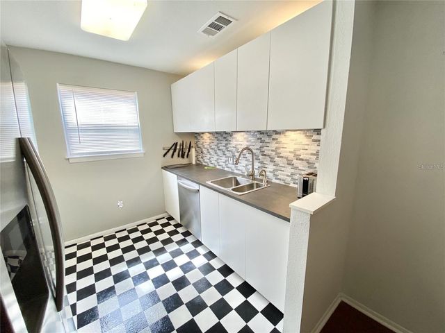 225 S TROPICAL TRAIL 312, Merritt Island, FL 32952