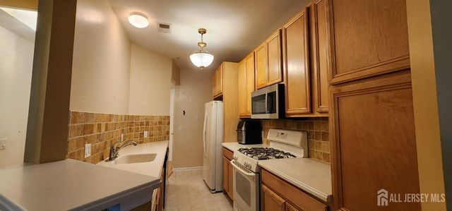2207 Cedar Village Boulevard, East Brunswick, NJ 08816
