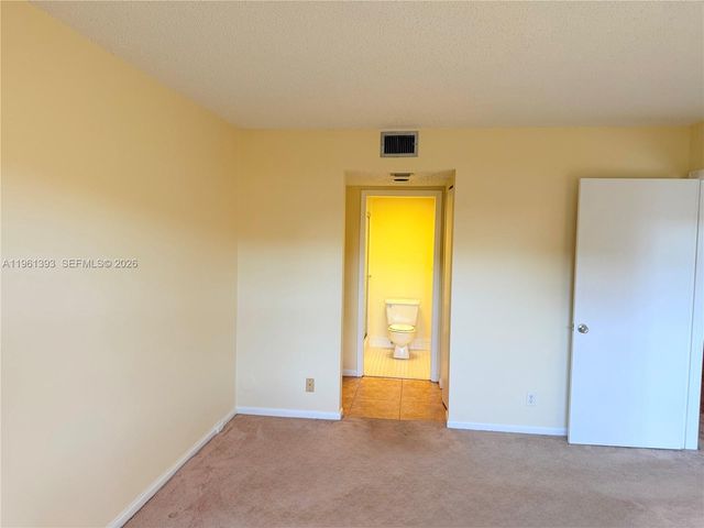 12950 SW 4th Ct 107H, Pembroke Pines, FL 33027