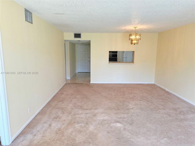 12950 SW 4th Ct 107H, Pembroke Pines, FL 33027