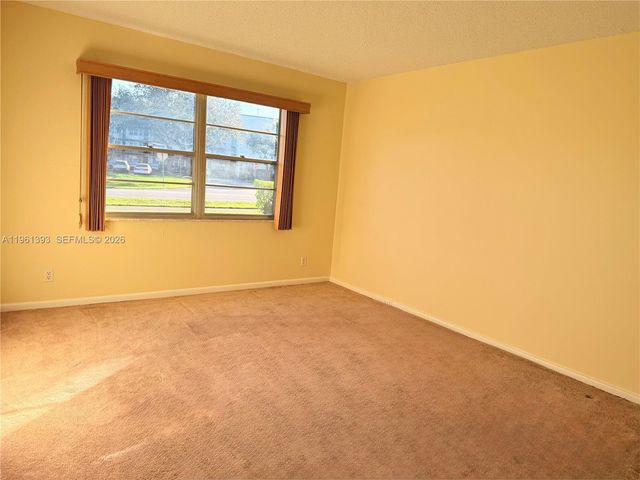 12950 SW 4th Ct 107H, Pembroke Pines, FL 33027