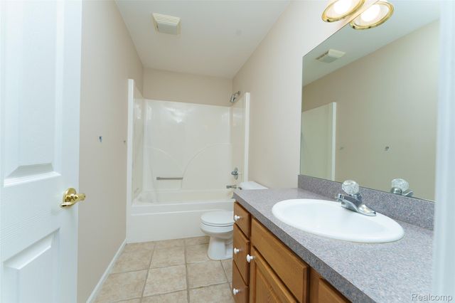216 Canterbury Court, Linden, MI 48451