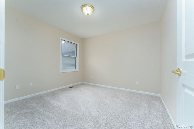 216 Canterbury Court, Linden, MI 48451