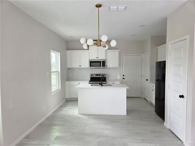 203 E Royal Palm Drive A, Mercedes, TX 78570