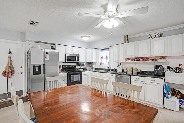 9471 SW 49th Place, Cooper City, FL 33328