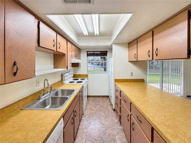 590 BELLTOWER AVENUE H, Deltona, FL 32725