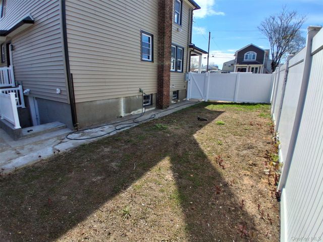 84 Holland Avenue, Elmont, NY 11003