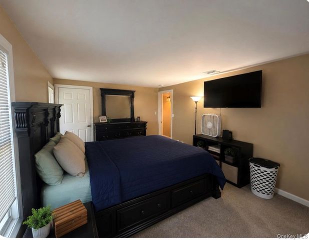 4 Valley Forge Court A, Ridge, NY 11961