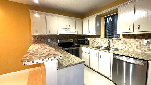 303 Waterview Drive, Palm Springs, FL 33461
