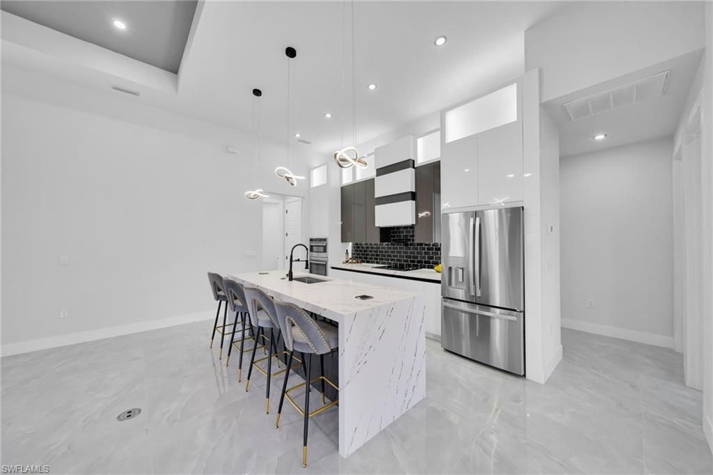 Image 11 of property listing at 3009 NW VAN BUREN PKWY, Cape Coral, FL 33993