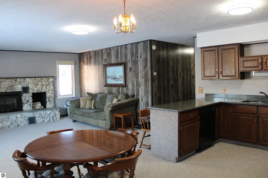 Image 4 of property listing at 11810 Chaney Drive, Rapid City, MI 49676