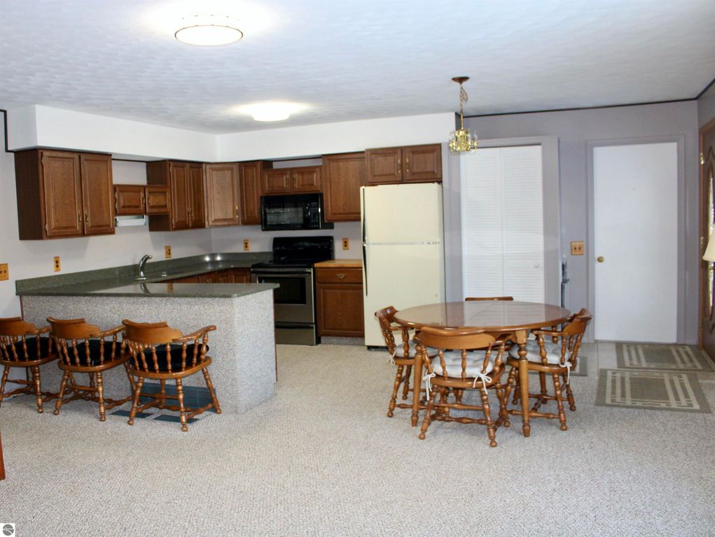 Image 5 of property listing at 11810 Chaney Drive, Rapid City, MI 49676