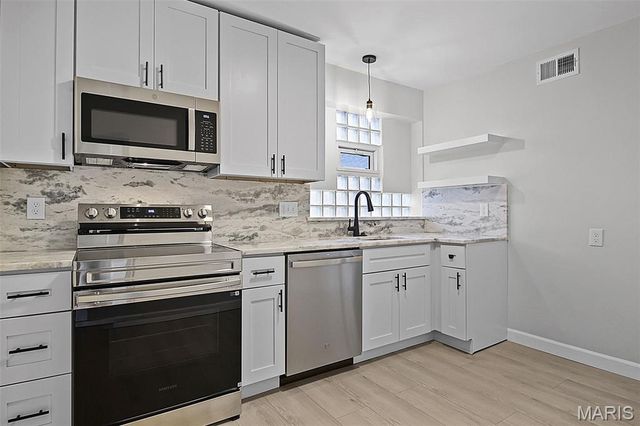 7562 Melrose Avenue, University City, MO 63130