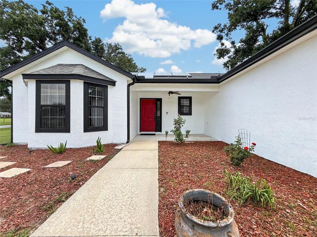 370 CARRIAGE LANE, Lady Lake, FL 32159