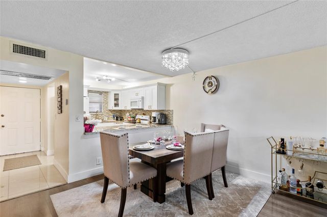 9300 SW 8th Street 102, Boca Raton, FL 33428