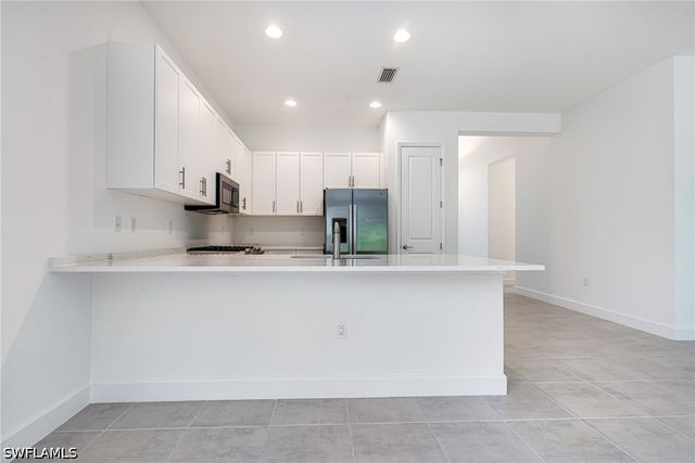 12448 Violet LN, Naples, FL 34120