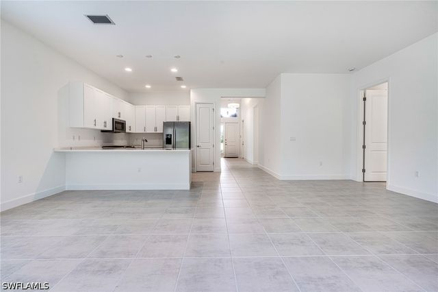 12448 Violet LN, Naples, FL 34120