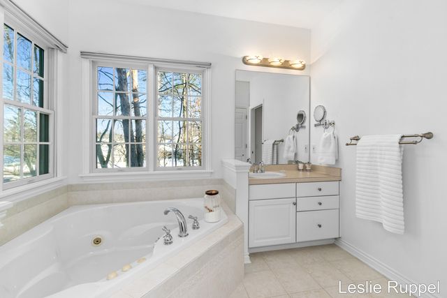 7913 Jonathan Woods Drive SE, Ada, MI 49301