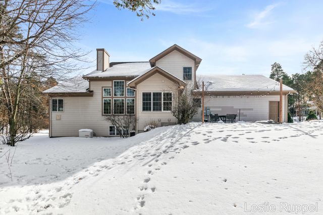 7913 Jonathan Woods Drive SE, Ada, MI 49301