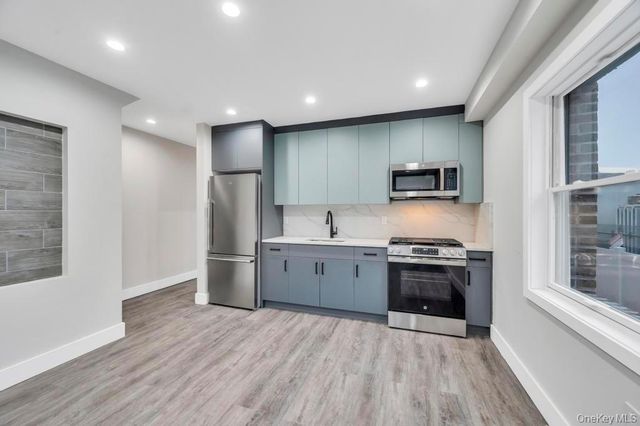 38-24 56 Street, Woodside, NY 11377