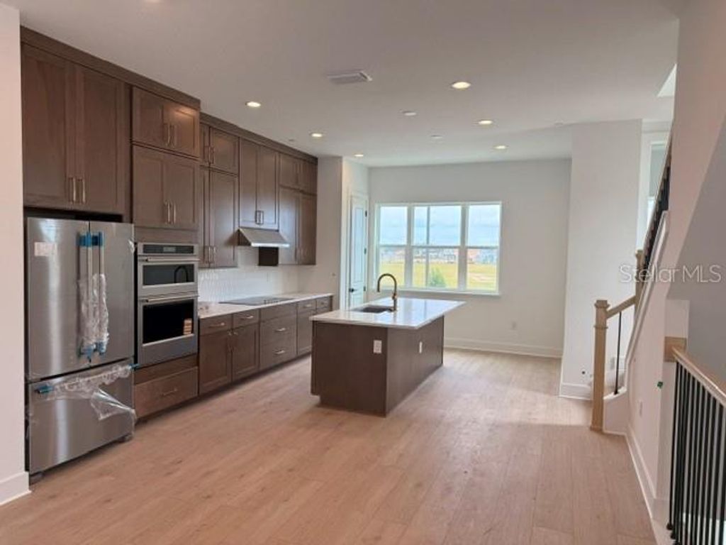 Image 4 of property listing at 9297 LUMINARY BOULEVARD, Orlando, FL 32827