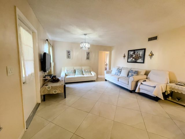 309 Pine Ridge Circle A-1, Greenacres, FL 33463