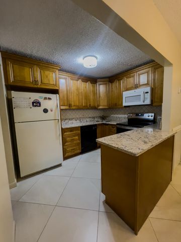 309 Pine Ridge Circle A-1, Greenacres, FL 33463