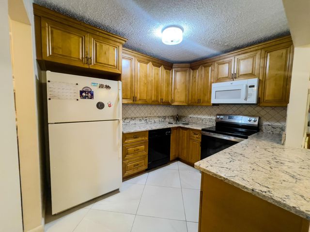 309 Pine Ridge Circle A-1, Greenacres, FL 33463