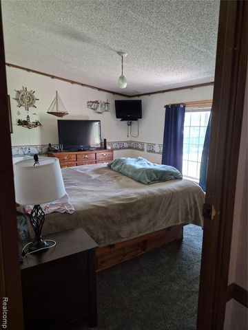 12849 S Delaney Road, Perry, MI 48872