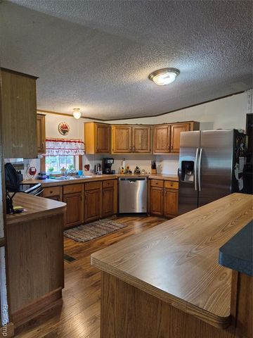 12849 S Delaney Road, Perry, MI 48872
