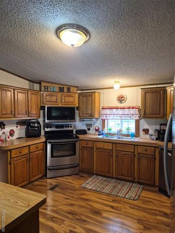 12849 S Delaney Road, Perry, MI 48872