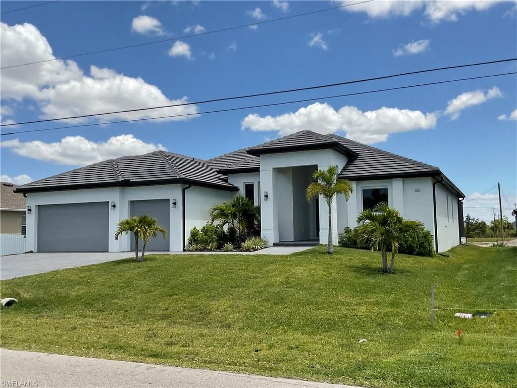 335 SW 31st PL, CAPE CORAL, FL 33991 — photo 2