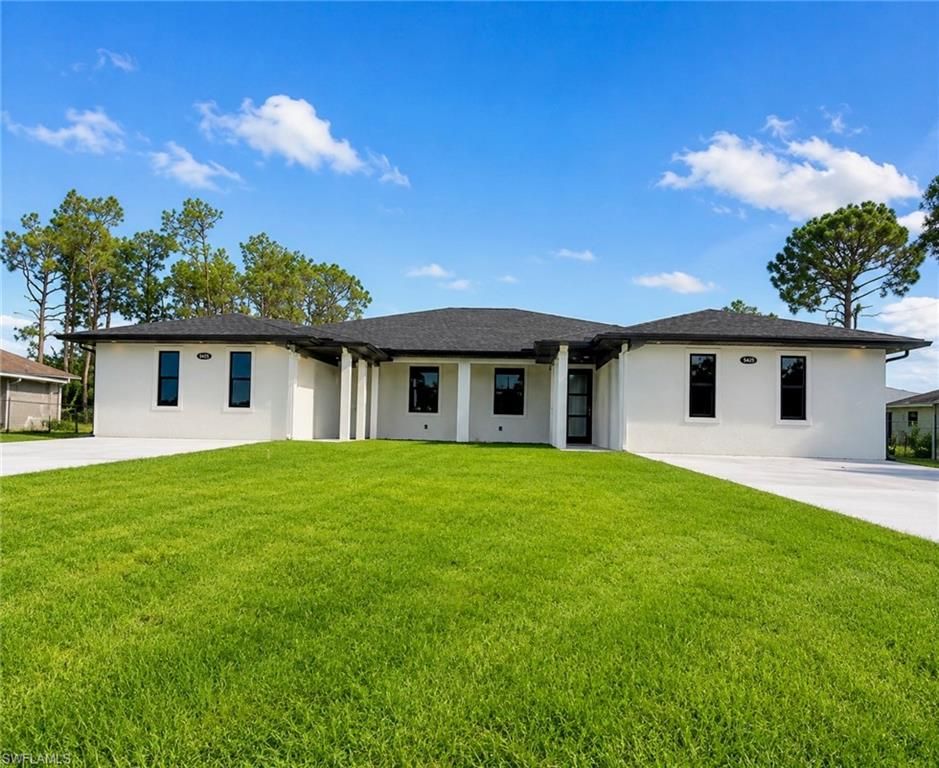 5425/5427 Centennial BLVD, LEHIGH ACRES, FL 33971 — exterior