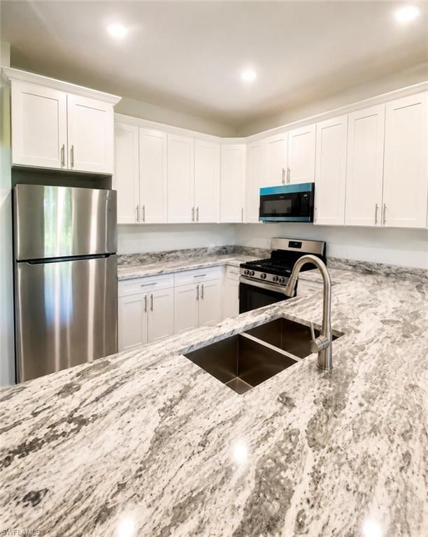5425/5427 Centennial BLVD, LEHIGH ACRES, FL 33971 — photo 3