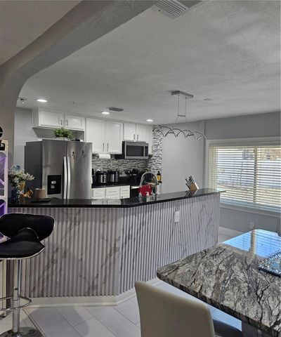 9306 FOREST HILLS DRIVE, Tampa, FL 33612