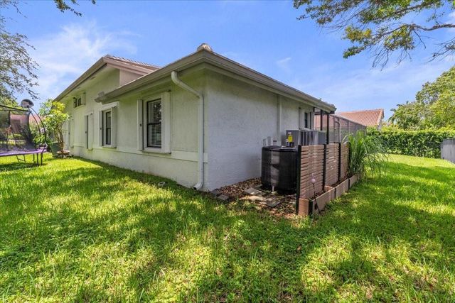4911 NW 96th Drive, Coral Springs, FL 33076